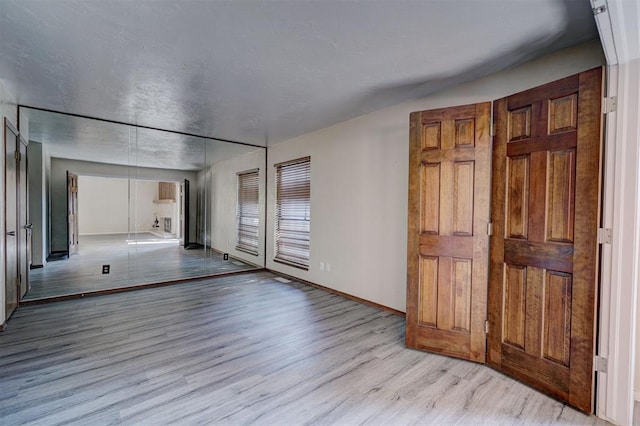 empty room featuring light wood-type flooring