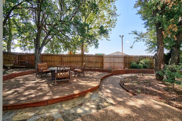 view of patio featuring a wooden deck