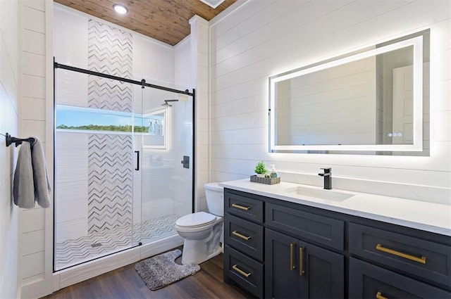 bathroom featuring vanity, hardwood / wood-style flooring, wooden ceiling, toilet, and a shower with shower door