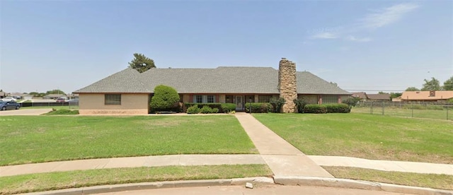 1405 Rosehaven Dr, Altus, OK 73521 - ranch-style home with a chimney