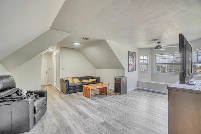 1405 Rosehaven Dr, Altus, OK 73521 - living room featuring light wood-type flooring, ceiling fan, and lofted ceiling