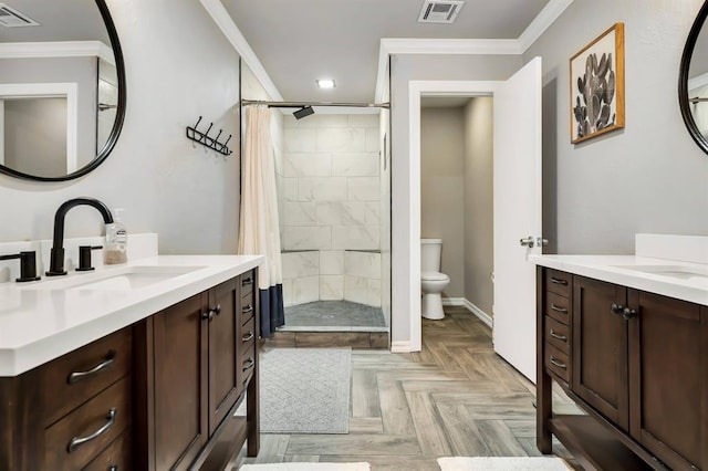 1405 Rosehaven Dr, Altus, OK 73521 - bathroom featuring a shower stall, two vanities, crown molding, and recessed lighting