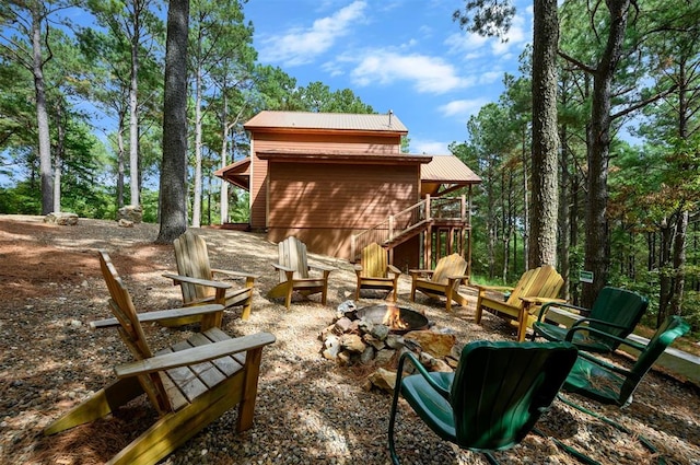 view of patio featuring a fire pit