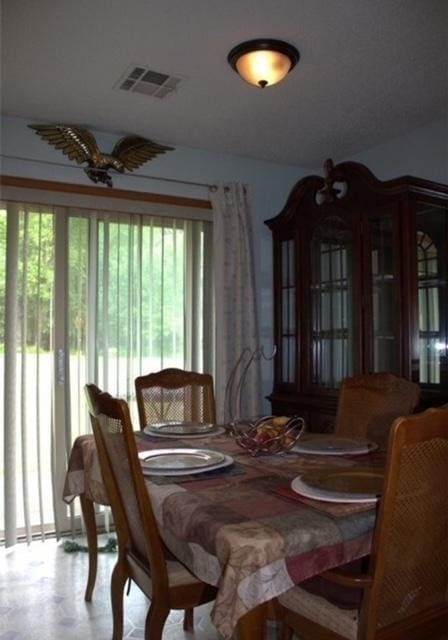 dining space featuring ceiling fan