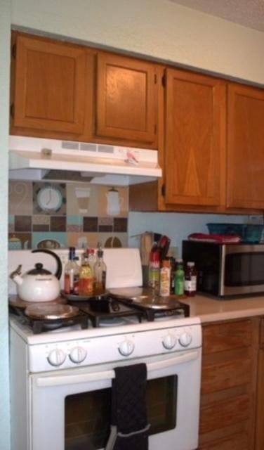 kitchen featuring gas range gas stove