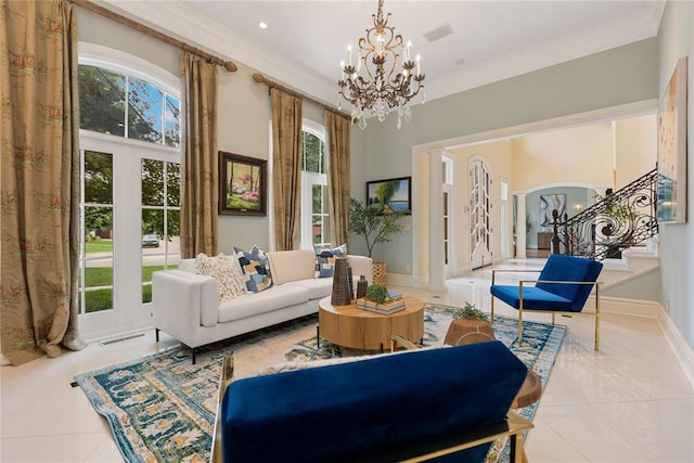 interior space with plenty of natural light, ornamental molding, and a notable chandelier