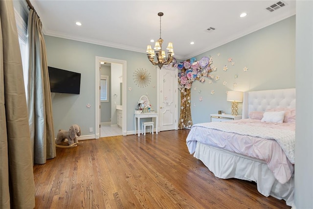 bedroom with a chandelier, ensuite bathroom, ornamental molding, and hardwood / wood-style flooring