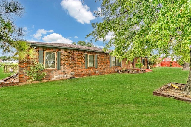 exterior space with a lawn