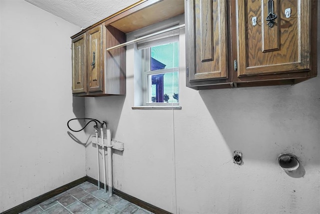 washroom with cabinets