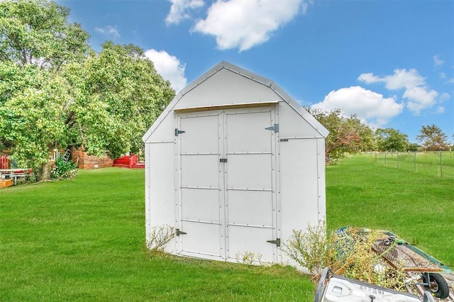 view of outdoor structure featuring a yard