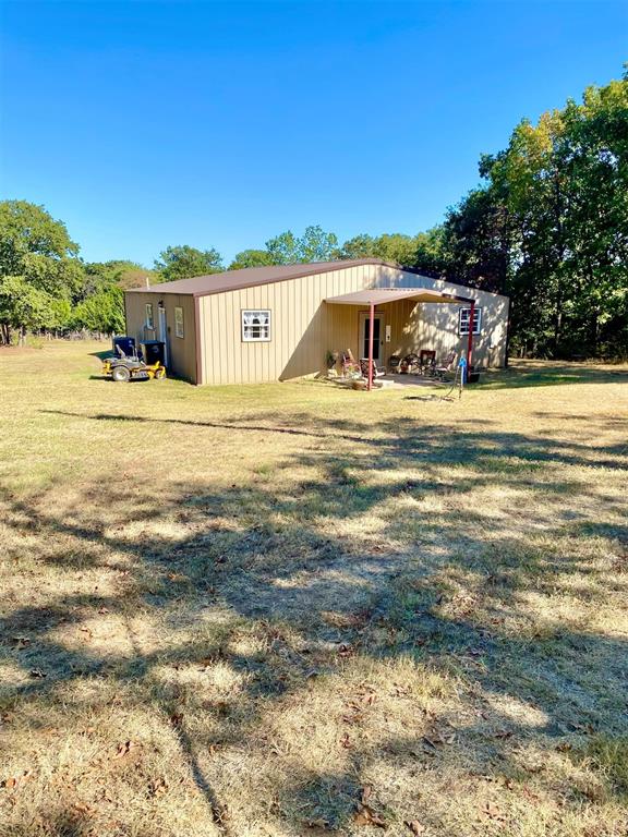 exterior space with a lawn