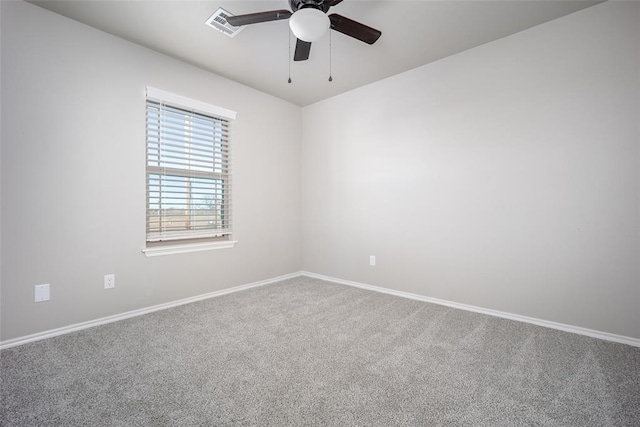 carpeted empty room with ceiling fan