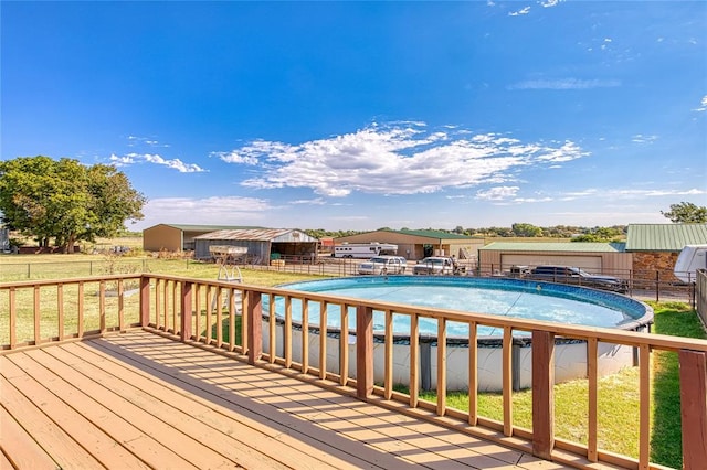 view of pool featuring a wooden deck