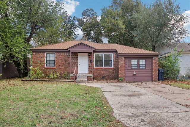 ranch-style home featuring a front yard