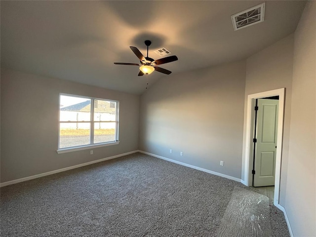 empty room with carpet, ceiling fan, and lofted ceiling