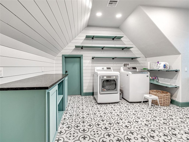 laundry area with washing machine and dryer