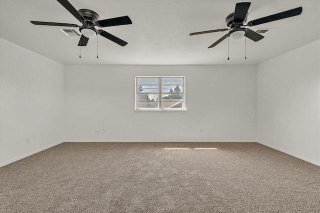 carpeted empty room with ceiling fan