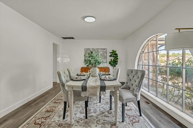 dining room featuring hardwood / wood-style flooring