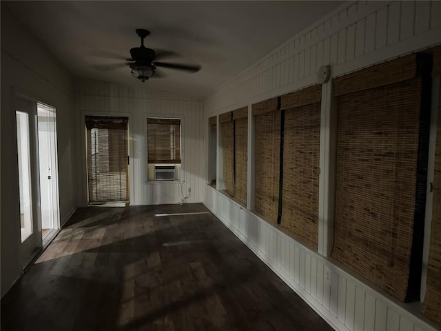 interior space featuring ceiling fan and cooling unit