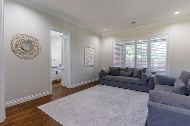 living room featuring dark hardwood / wood-style floors and ornamental molding