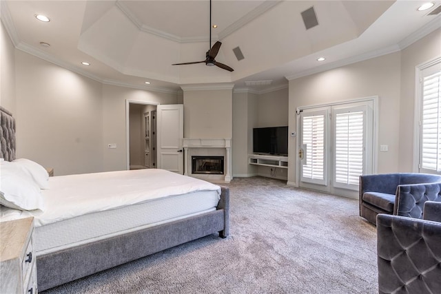 bedroom featuring carpet, ceiling fan, and crown molding