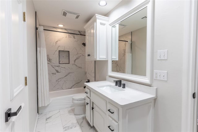 full bathroom featuring vanity, shower / tub combo, and toilet