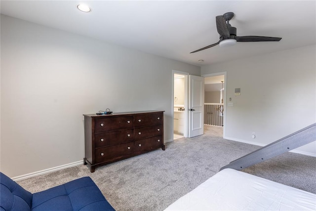 bedroom featuring light colored carpet and ceiling fan