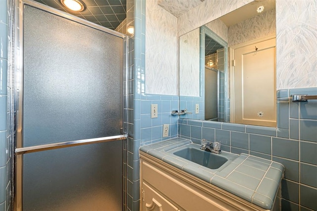 bathroom with vanity and walk in shower