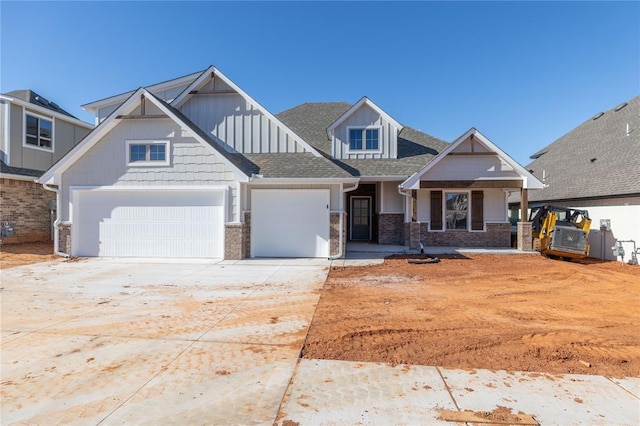 craftsman inspired home featuring covered porch