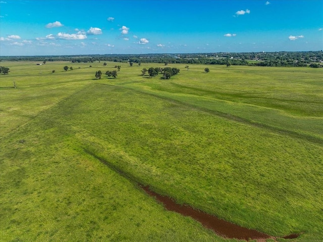 birds eye view of property featuring a rural view