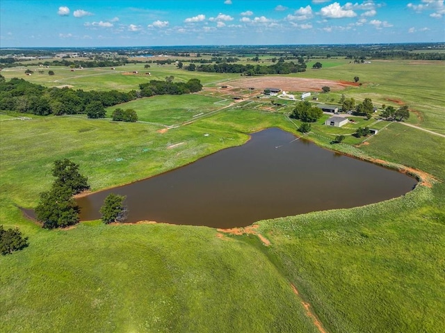 aerial view featuring a rural view and a water view