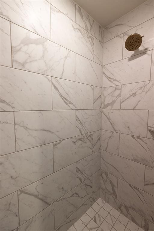 room details with a tile shower