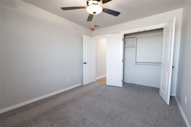 unfurnished bedroom with a closet, ceiling fan, and carpet