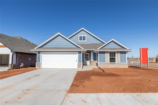 craftsman-style home with a garage