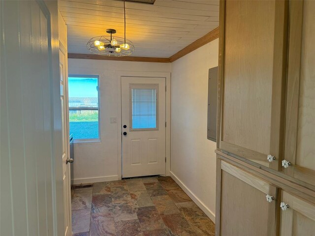 entryway with a chandelier, ornamental molding, and wood ceiling