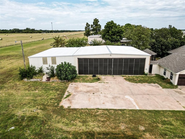 exterior space with a rural view