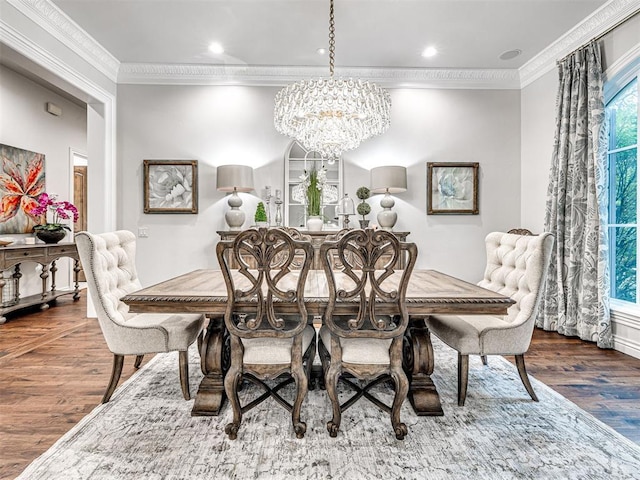 dining room featuring a notable chandelier, dark hardwood / wood-style flooring, and crown molding