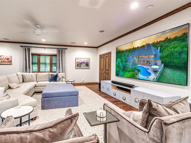 living room featuring ceiling fan, hardwood / wood-style floors, and ornamental molding