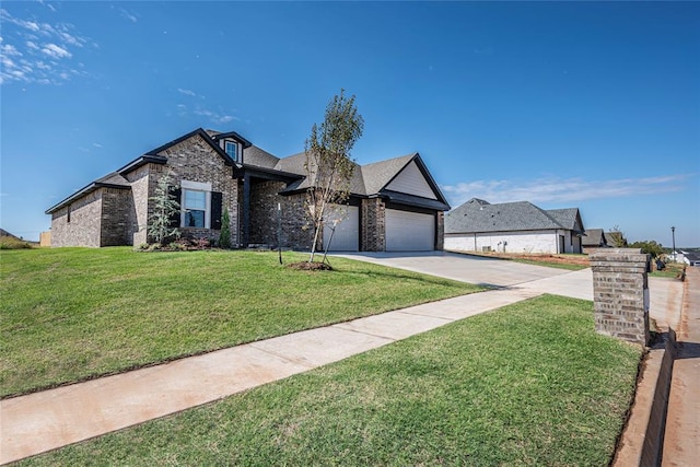 view of front of home with a front lawn and a garage