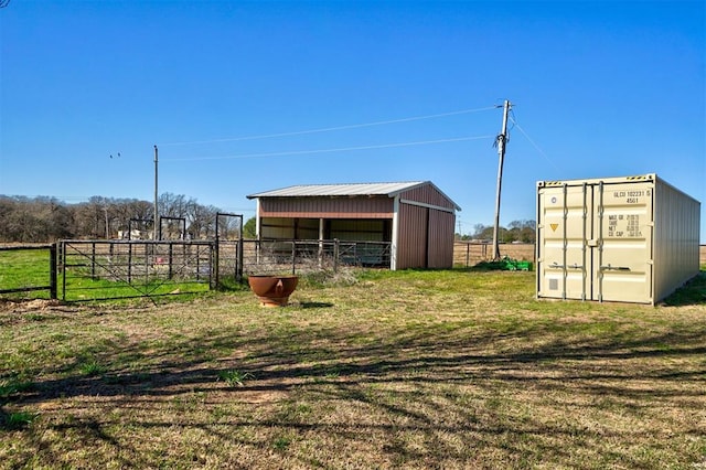 view of outdoor structure featuring a lawn