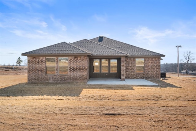 rear view of house with a patio