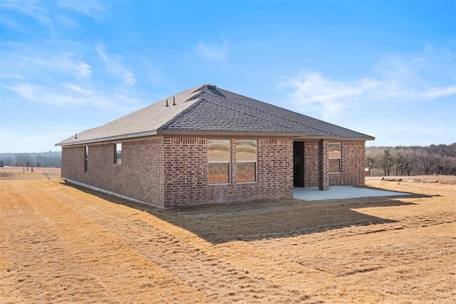 back of house featuring a patio