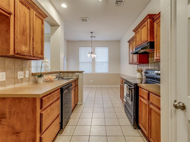 kitchen with black appliances, decorative light fixtures, tasteful backsplash, and a chandelier