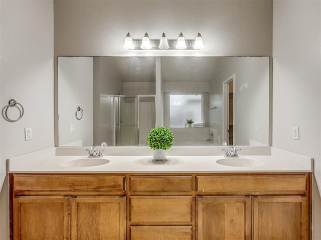 bathroom with vanity and an enclosed shower