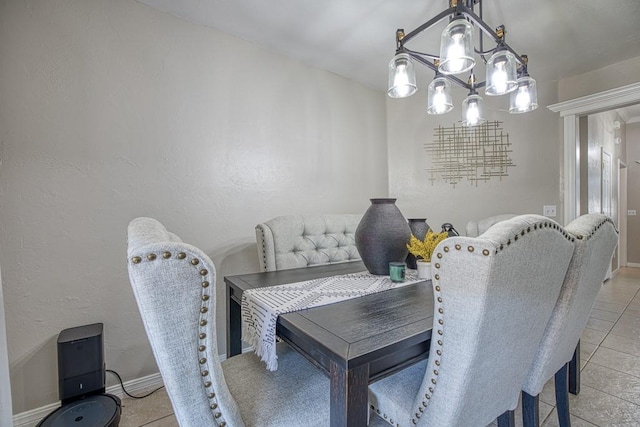 tiled dining area with a notable chandelier