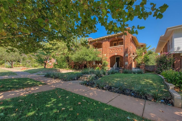 view of front of property with a front lawn