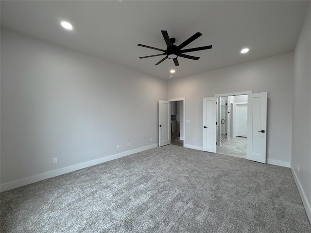 unfurnished bedroom with ceiling fan and light carpet