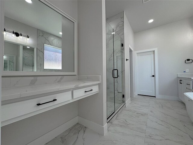 bathroom with vanity and an enclosed shower