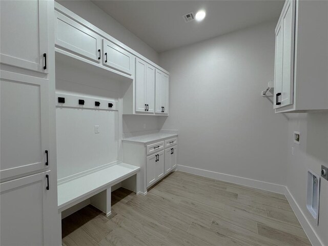 mudroom with light wood-type flooring