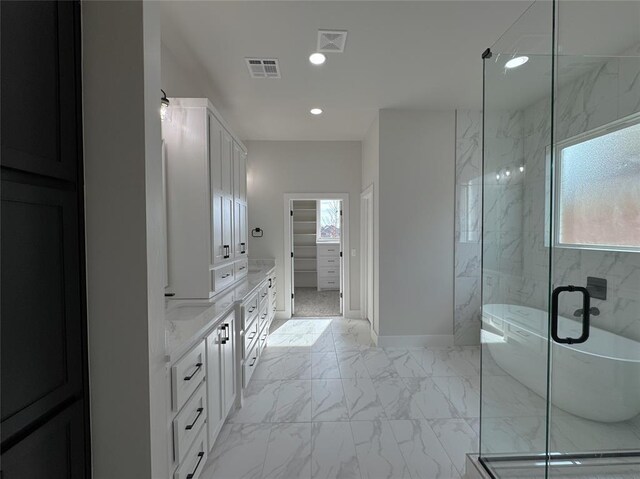 bathroom with plus walk in shower and vanity